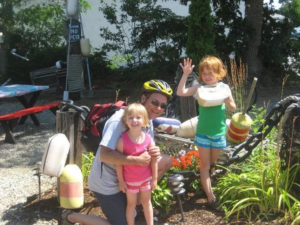 Steve Brabeck and granddaughters in Cape Cod, a favorite family vacation spot.